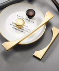 4 Pack Brushed Gold Cabinet Drawer Pulls in Zinc Alloy with Brushed Brass Finish, shown on a gray surface with circular decor.