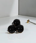 Heavy Duty 2 Inch Swivel Ball Casters Rolls Smooth As Silk Dead Silent Metal Furniture Wheels Top Shelf Build Easy Install Long Lasting For Coffee Tables Cabinets Shelves And Home Decor 4 Pack visible with three black wheels and a screw.