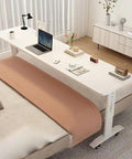 Smooth Rolling Height Adjustable Laptop Desk On Wheels For Home Office And Bedside Setup Ergonomic Portable Standing Workstation with laptop, coffee, and decor.