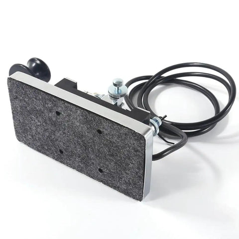 Shortwave Telegraph Key For Precise Morse Code Transmission, 6.5mm Connector, copper casing, underside view with coiled cable