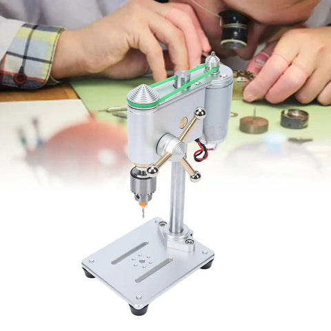 Cool Compact Mini Drill Press Machine With 360 Degree Rotation And Variable Speed Control For Wood, Metal And Jewelry Projects on workbench.