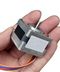 35mm Frame Nema 14 Stepper Motor 0.19A 12V 0.1N.m 61 Ohm Two Phase Four Wire Hybrid For CNC Machines And 3D Printers 5mm Shaft Smooth Quiet Motion And Precise Control, palm held