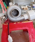 Close-up of a 500W Portable Micro Hydroelectric Generator For Outdoor Power On The Go 220V Water Turbine with aluminum alloy body.
