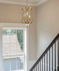 Eleanor 27 Inch Traditional 3 Light Cylinder Pendant Chandelier with adjustable height in antique white finish hanging in foyer