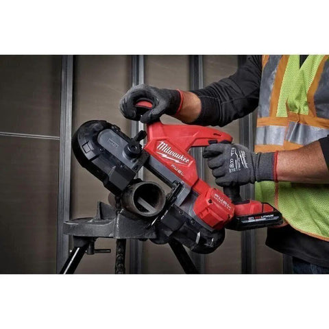 Ultra Light 18V Cordless Band Saw With Brushless Motor And Constant Power Tech Delivers The Fastest Cuts In Its Class For Portable Tough Jobs On The Jobsite, No Hype being used to cut metal pipe on a job site