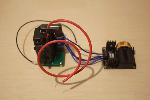 Mini DC Induction Jacobs Ladder High Voltage Arc Tesla Coil Kit for DIY enthusiasts with visible ZVS power supply