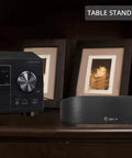 Indoor Amplified AM FM Radio Antenna With 50 Mile Range And Multi Directional Reception next to stereo receiver on table
