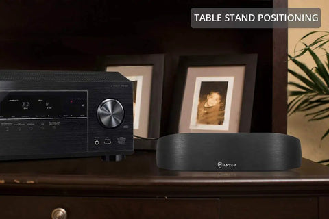 Indoor Amplified AM FM Radio Antenna With 50 Mile Range And Multi Directional Reception next to stereo receiver on table