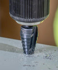 Step Drill Bit Set With Double Flutes For Clean Cuts And Easy Read Markings, 1/4 To 3/4 Inch, 3/8 Inch Hex Shank in use on metal