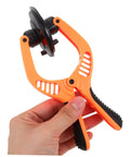 Hand holding orange Mobile Phone Screen Opening Tool With Cup And Pliers For Quick Repairs Pro Grade LCD Removal Kit For Phones And Tablets Easy To Use Do It Yourself DIY Screen Repair Tool
