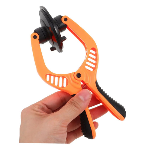 Hand holding orange Mobile Phone Screen Opening Tool With Cup And Pliers For Quick Repairs Pro Grade LCD Removal Kit For Phones And Tablets Easy To Use Do It Yourself DIY Screen Repair Tool
