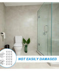 Bathroom with shower showing 40 Piece Zinc Alloy Glass Shelf Clamp Brackets for Shower Glass Panels and Floating Shelves.