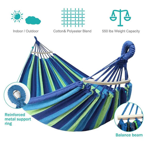 Portable Camping Hammock With Upgraded 320G Canvas Fabric For Super Comfy Relaxation 550Lb Weight Capacity Anti Roll Balance Beams Sturdy Tree Straps Easy Setup For Camping Patio Backyard Or Outdoor Adventures Blue Green with striped fabric and reinforced metal support ring.