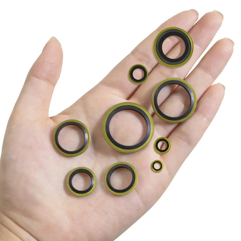A hand holding assorted sizes of sealing washers from a 378 Piece NBR Metal Bonded Sealing Washer Kit With 12 Sizes M6 Through M30 For Automotive Self Centered Seal Gasket Repair Set, High Pressure And Heat Resistant Rubber To Metal Gaskets.