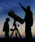 Two people using 130mm Newtonian Reflector Telescope For Grownups With 130EQ Mount High Quality Optics under night sky.