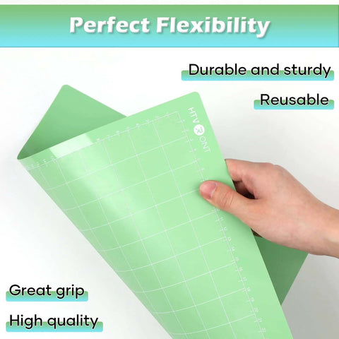Side view of two green HTVRONT 12x12 cutting mats with white grid lines and edge rulers for Cricut machines.