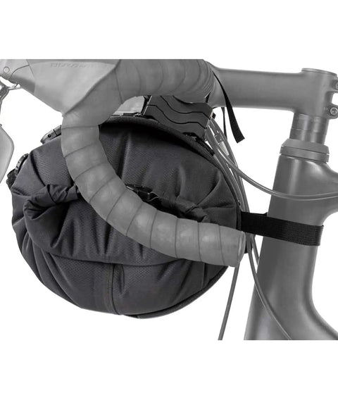 Frontloader 8 Liter Bar Bag For Bike Handlebar Mount, waterproof black gear carrier with quick release straps, mounted on bike