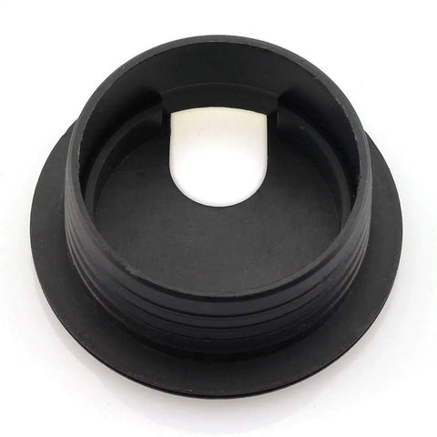 Close-up of black plastic desk wire grommet for 1-1/2 inch hole, part of 2 Pack 1-1/2 Inch Desk Wire Grommets Hole Covers Black Plastic Cord Organizer For Office PC Desk Cable Management And Neat Wires Keeps Cables Hidden And Tidy.