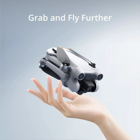 Hand holding Ultra Light Mini 3 Pro Drone With 4K Video And 48MP Photos 34 Minute Flight Time Sub 249 Grams Foldable Pocket Friendly Aerial Camera