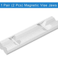 Top Shelf 6 Inch Aluminum Vise Jaws With Snazzy Magnetic Backing And Soft Rubber Pads For Gripping Tight On Pipes Wood Plastics And Plumbing Fittings Without Scratching Your Projects In The Shop, close-up view.