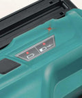 Close-up of 18V LXT Cordless 2-Inch Brad Nailer battery indicator with 110-nail magazine, showing tool-free adjustment.