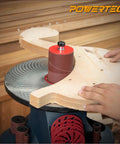 Person using Pro Grade 4.5 Inch Sanding Sleeves Set For Spindle Sander Aluminum Oxide 18 Piece Assortment on wood piece