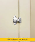Built Tight Slick Chrome Slide Latch and Keeper Set on a beige door, surface mount for secure fastening.