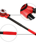 Beefy Heavy Duty Manual Pipe Threader Kit With Four Die Heads Ratchet Handle And Hard Case For One Half Inch To One And A Quarter Inch Pipes Built Tough A Real Workhorse For Quick Clean Threads On Real World Plumbing Jobs showing close-up of ratchet handle with red grip and tubular steel body