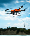 Fisherman Max Heavy Lift Fishing Drone With 7.0 Lbs Bait Capacity 1.5Km Casting Range IP67 Waterproof Foldable Drone 4K Camera flying over water