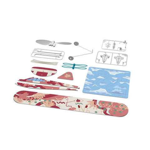 Rubber Band Aeroplane High Wing STEM Kit Lets You Fly Your Own Plane With A Handy Learning Booklet And Activities Battery Free For Indoor Or Outdoor Fun Includes Display Stand To Show Off Your Design Ages 14 Plus, parts laid out