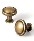 Top Shelf Antique Brass Cabinet Knobs Six Pack Round single hole zinc alloy knobs showcasing vintage aged brass finish.