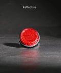 Single red reflector from Red Reflectors Motorcycle License Plate Bolts And Nuts Kit With Mini Decorative M5 Screws For Bike 6 Piece