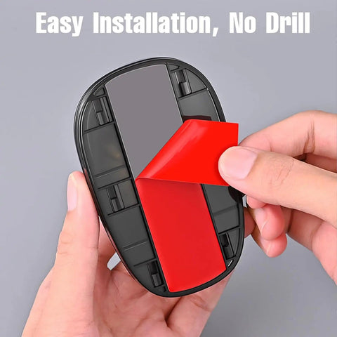 Person peeling adhesive from Lit Neon RGB Car Roof Strobe Lights For Cars Trucks SUVs Jeeps RVs Wireless LED Warning Lamps Solar Powered Or USB C Charge Vibration Sensor No Drill Waterproof 5 Pack.