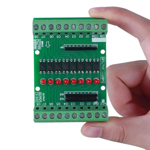 8 Channel Isolation Module For DC 12V 24V Power And Control Signals, PNP NPN Low High Level Output, held in hand close-up