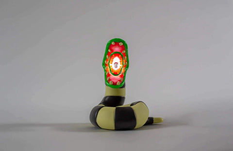 Beetlejuice Sandworm LED Mood Light, white sandworm figure lamp turned on, 4.75 inches tall, ideal for spooky decor.