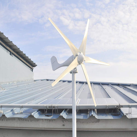 400W 12V Wind Turbine Kit With Five Blades And Charge Controller For Marine RV Or Home Use mounted on rooftop, clear sky