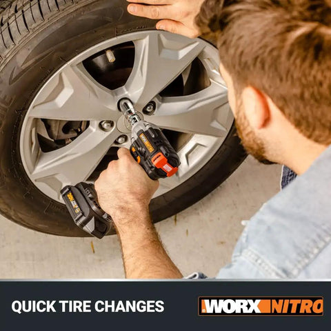 Man using 20-Volt One-Half Inch Cordless Impact Wrench With Brushless Motor, Battery And Charger Included, Model WX272L on tire