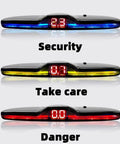 Rear Parking Sensor System With Built In Ultrasonic Sensors, Four Sensor Setup, LED Distance Display showing three alerts.