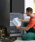Man installing Easy Install Refrigerator Ice Maker Replacement Kit For Whirlpool And Kenmore Fits Side Wall Mounts Quick Clip On