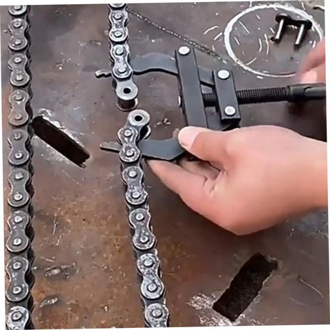 Heavy Duty Steel Motorcycle Chain Tensioner Tool Knockout Adjuster For Dirt Bikes And Cruisers being used on a motorcycle chain.