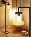 Industrial Floor Lamp With Glass Shade And Tall Pole, Black Modern Metal Standing Light, shown in a cozy living room scene