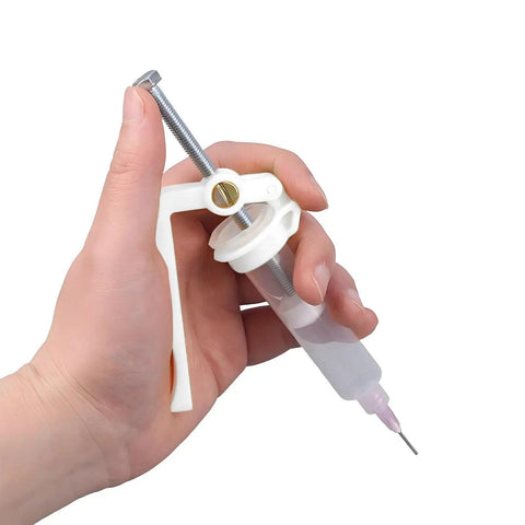 Effortless Solder Flux Gun For Precision Paste Dispensing Handheld Flux Extruder And Needle Dispenser in hand