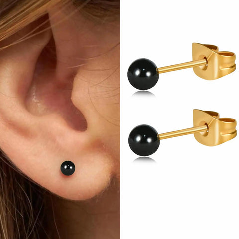 Dope Dainty Ball Stud Earrings Set For Women And Men, 3mm Tiny Black Hand Painted Enamel Color, Hypoallergenic Surgical Steel With 14K Gold Plated Option, Great For Second Piercings And Multiple Holes, Everyday Cute Jewelry. Black 3mm stud earring worn in ear and shown with gold-plated backing.