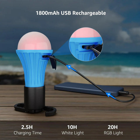 Rechargeable Camping Lantern With 7 Light Modes 3 White 4 RGB USB Cable Included showing charging process on wooden table