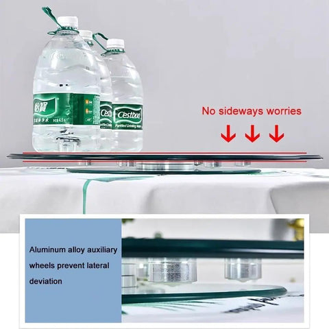 Side view of 31-35 Inch Tempered Glass Lazy Susan No Fuss Rotating Serving Tray showing stability with aluminum wheels underneath.