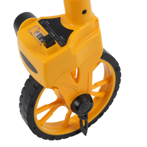 Folding Measuring Wheel 9999.9m with One Touch Reset and Accuracy 0.5%, close-up of durable yellow wheel design.