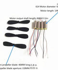 614 Hollow Cup Drone Propellers And Coreless Micro Motors Kit with 16 propeller blades and 4 micro motors displayed