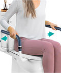 Adjustable Toilet Safety Rail With Rock Solid Stability And Hella Strong Build For Seniors And Elderly Adults Featuring No Fuss Mounting and Smooth Everyday Use In Any Home Bathroom, close-up of user holding rail.