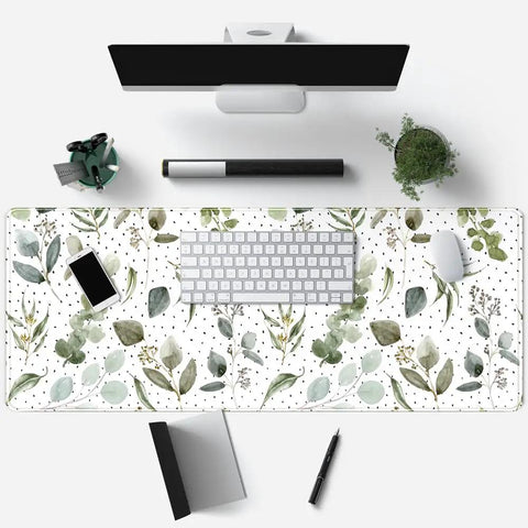 Top view of green speckled boho mouse pad desk mat with non slip rubber base, stitched edges, large 31.5x11.8 inches