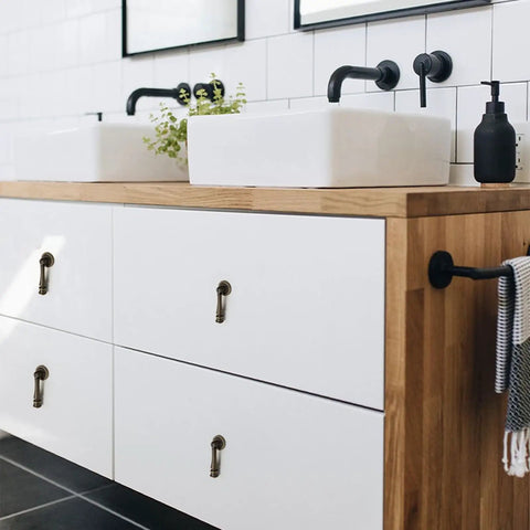 Slick Eight Piece Set Of Black Solid Brass Cabinet Knobs And Drop Style Pulls For Kitchen Drawers And Cupboards With Dang Tough Screw Mount Hardware That Brings Badass Retro Charm To Your Home on a modern white bathroom vanity.